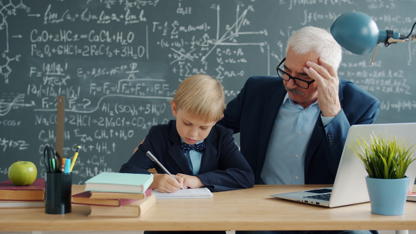 Tutor with a student at a breakthrough moment