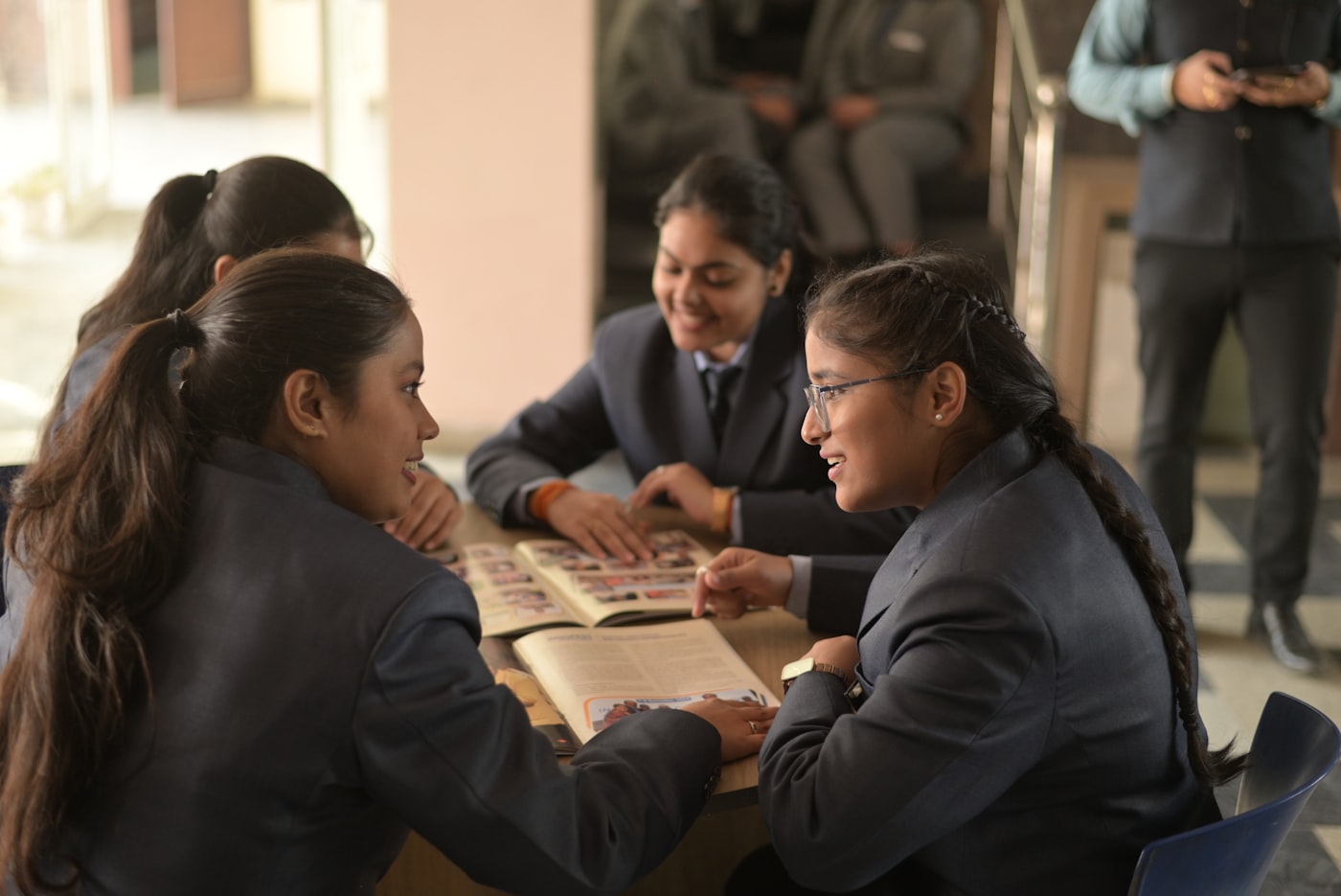 Language class conversation circle, students talking together