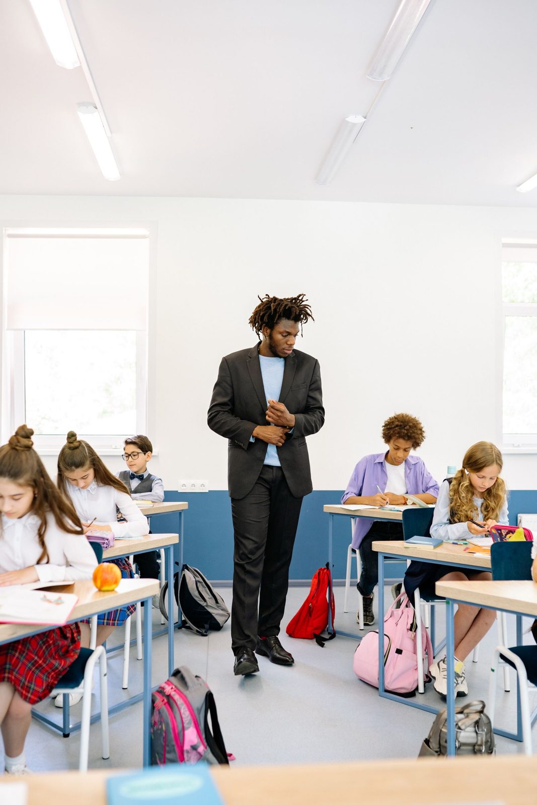 Teacher leading a lively class discussion